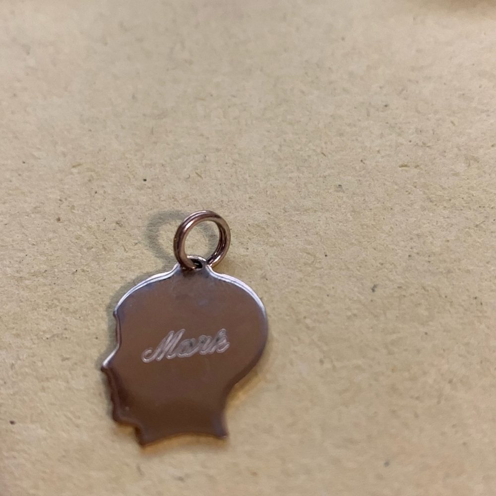Mark charm